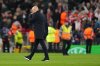 Liverpool's manager Arne Slot leaves the pitch after the Champions League opening phase soccer match between Liverpool and PSV in Liverpool, England, Wednesday, Nov. 26, 2025. (AP Photo/Jon Super)