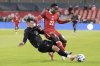 Canada's Richie Laryea, right, is tackled by Ecuador's Alan Franco Palma during first half international friendly soccer action, in Toronto, on Thursday, November 13, 2025. THE CANADIAN PRESS/Chris Young