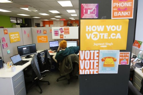A New Democratic Party campaign team member works at the NDP headquarters in Ottawa, on Friday, March 21, 2025. THE CANADIAN PRESS/ Patrick Doyle