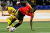 Belgium Amadou Onana, right, and Kazakhstan's Islam Chesnokov challenge for the ball during the 2026 World Cup group J qualifying soccer match between Kazakhstan and Belgium in Astana, Kazakhstan, Saturday, Nov. 15, 2025. (AP Photo)