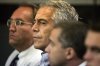 FILE - In this July 30, 2008, file photo, Jeffrey Epstein, center, appears in court in West Palm Beach, Fla. (Uma Sanghvi/The Palm Beach Post via AP, File)