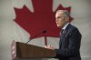 Prime Minister Mark Carney makes an announcement at the manufacturing facility of Maple Leaf Homes in Fredericton, N.B., on Monday, Nov. 10, 2025. THE CANADIAN PRESS/Stephen MacGillivray