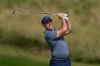Rory McIlroy of Northern Ireland watches after playing second shot on the 7th hole during the final round of Abu Dhabi Golf Championship in Abu Dhabi, United Arab Emirates, Sunday, Nov. 9, 2025. (AP Photo/Altaf Qadri)