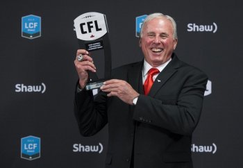Calgary Stampeders' John Hufnagel is honoured with the Hugh Campbell Distinguished Leadership Award at the CFL Awards during the CFL's Grey Cup week in Calgary, Thursday, Nov. 21, 2019. THE CANADIAN PRESS/Nathan Denette