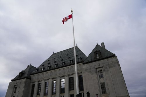 The flag of the Supreme Court of Canada flies on the east flagpole in Ottawa on Monday, Nov. 28, 2022. THE CANADIAN PRESS/Sean Kilpatrick
