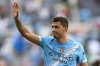 FILE - Manchester City's Rodri (16) acknowledges fans in the stands after the Club World Cup Group G soccer match against Juventus, June 27, 2025 in Orlando, Fla. (AP Photo/Phelan M. Ebenhack, File)