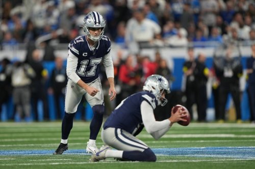 Dallas Cowboys kicker Brandon Aubrey (17), with Bryan Anger holding, attempts a field goal against the Detroit Lions during the second half of an NFL football game Thursday, Dec. 4, 2025, in Detroit. (AP Photo/Ryan Sun)