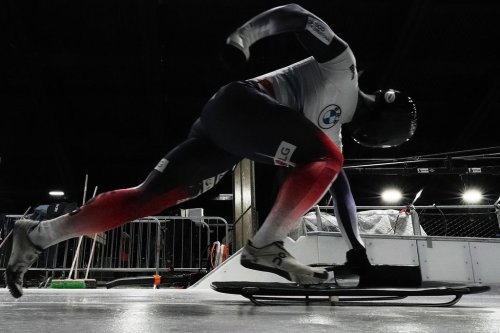 South Korea's Jung Seunggi takes the start at a training session ahead of a three day skeleton and bobsled World Cup stage and Olympic test event in Cortina D'Ampezzo, Italy, Wednesday, Nov. 19, 2025. (AP Photo/Andrew Medichini)