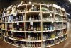 FILE - This June 16, 2016, file photo, taken with a fisheye lens, shows bottles of alcohol during a tour of a state liquor store, in Salt Lake City. (AP Photo/Rick Bowmer, File)
