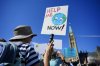People participate in a climate protest on Parliament Hill in Ottawa on Friday, Sept. 15, 2023. THE CANADIAN PRESS/Sean Kilpatrick