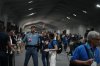 A security officer directs people to leave the venue for the COP30 U.N. Climate Summit, Thursday, Nov. 20, 2025, in Belem, Brazil. (AP Photo/Fernando Llano)