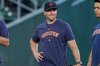 FILE - Houston Astros hitting coach Troy Snitker talks with players before a baseball game against the Tampa Bay Rays, Friday, July 28, 2023, in Houston. (AP Photo/Kevin M. Cox, File)