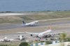 A COPA Airlines plane takes off at Simon Bolivar International Airport in Maiquetia, Venezuela, Monday, Dec. 1, 2025, days after the government revoked operating rights for international airlines that suspended flights following a warning from the U.S. Federal Aviation Administration.(AP Photo/Cristian Hernandez)