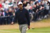 FILE - Tiger Woods, of the United States, walks to the 18th green during the second round of the British Open Golf Championships at Royal Troon golf club in Troon, Scotland, July 19, 2024. (AP Photo/Scott Heppell, File)