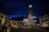 A couple takes a photo in front of the Milan Cortina Winter Olympics countdown clock, in Cortina D'Ampezzo, Friday, Nov. 21, 2025. (AP Photo/Andrew Medichini)