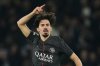 PSG's Vitinha celebrates after scoring his side's second goal during a Champions League opening phase soccer match between Paris Saint Germain and Tottenham, in Paris, Wednesday, Nov.26, 2025. (AP Photo/Christophe Ena)