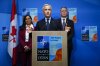 Prime Minister Mark Carney holds a closing press conference with Minister of Foreign Affairs Anita Anand, left and Minister of National Defence David McGuinty following the NATO Summit in The Hague, Netherlands on Wednesday, June 25, 2025. THE CANADIAN PRESS/Sean Kilpatrick