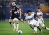 Vancouver Whitecaps midfielder Ralph Priso (6) fights for the ball with San Diego FC midfielder Anders Dreyer (10) during the first half of an MLS Western Conference final soccer match, Saturday, Nov. 29, 2025, in San Diego. (AP Photo/Denis Poroy)