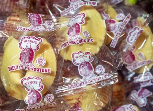 Wrapped fortune cookies are packaged at Wing Noodles Ltd. in Montreal's Chinatown on Tuesday, Nov. 18, 2025. The company has announced it will be closing at the end of November.  THE CANADIAN PRESS/Christinne Muschi