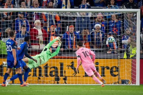 Inter Miami forward Lionel Messi (10) scores as FC Cincinnati goalkeeper Roman Celentano, third from left, tries to defend during the first half of MLS soccer's Eastern Conference semifinal Sunday, Nov. 23, 2025, in Cincinnati. (AP Photo/Tanner Pearson)