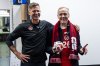 Canada's head coach Jesse Marsch and Prime Minister Mark Carney speak to Canada players following international friendly soccer action between Canada and Australia, in Montreal, on Friday, October 10, 2025. THE CANADIAN PRESS/Christopher Katsarov