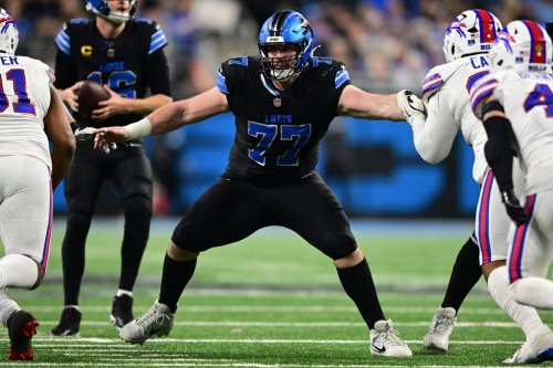 FILE - Detroit Lions center Frank Ragnow looks to block during the second half of an NFL football game against the Buffalo Bills in Detroit, Dec. 15, 2024. (AP Photo/David Dermer, File)