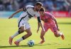 Vancouver Whitecaps' Thomas Muller (13) protects the ball from Inter Miami's Baltasar Rodriguez (11) during the first half of the MLS Cup final soccer match, in Fort Lauderdale, Fla., on Saturday, December 6, 2025. THE CANADIAN PRESS/Darryl Dyck