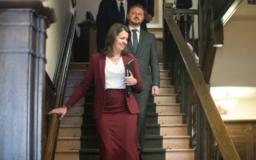 Alberta Premier Danielle Smith and Minister of Justice  Mickey Amery make their way to the swearing in of her cabinet, in Edmonton, Friday, June 9, 2023. THE CANADIAN PRESS/Jason Franson.