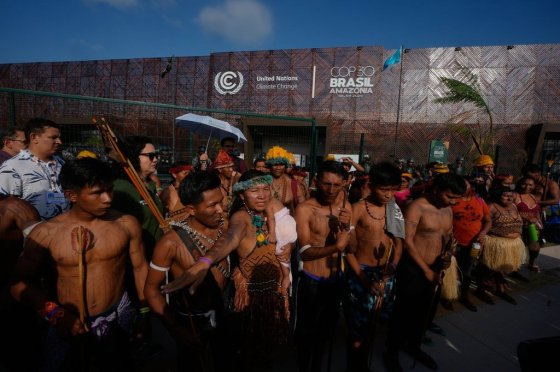 An Indigenous group blocks an entrance to the COP30 U.N. Climate Summit, Friday, Nov. 14, in Belem, Brazil. (Fernando Llano The Associated Press files)
