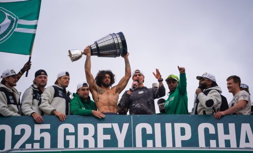 Saskatchewan Roughriders quarterback Trevor Harris (fourth from the right) speaks to spectators at Mosaic Stadium in Regina on Monday, Nov. 17, 2025. The Roughriders defeated Montreal Alouettes on Sunday to become the 112th Grey Cup champions. THE CANADIAN PRESS/Heywood Yu