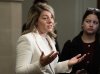 Industry Minister Melanie Joly speaks with reporters as she makes her way to a cabinet meeting on Parliament Hill, in Ottawa, Tuesday, Nov. 18, 2025. THE CANADIAN PRESS/Adrian Wyld