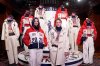 Snowboarders Brenna Huckaby, left, and Red Gerard unveil Ralph Lauren's Team USA closing and opening ceremony uniforms for the 2026 Milan Cortina Winter Olympics at Ralph Lauren headquarters, Wednesday, Dec. 3, 2025, in New York. (Photo by Charles Sykes/Invision/AP)