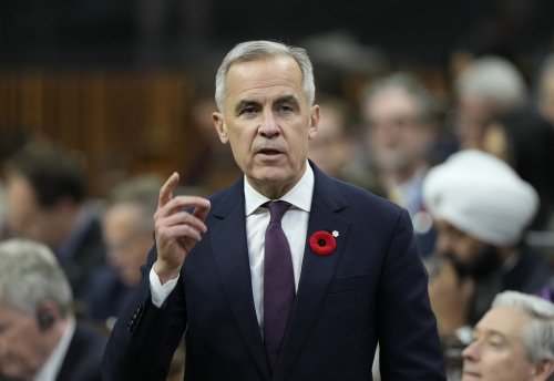 Prime Minister Mark Carney rises during Question Period on Parliament Hill in Ottawa, Thursday, Nov. 6, 2025. THE CANADIAN PRESS/Adrian Wyld