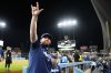 Toronto Blue Jays manager John Schneider gestures to fans after defeating the Los Angeles Dodgers in Game 5 of the World Series in Los Angeles on Oct. 29, 2025. THE CANADIAN PRESS/Frank Gunn