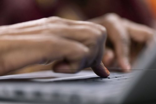 A person types during a keyboard basics class offered by Free Geek on Thursday, May 15, 2025, in Portland, Ore. (AP Photo/Jenny Kane)
