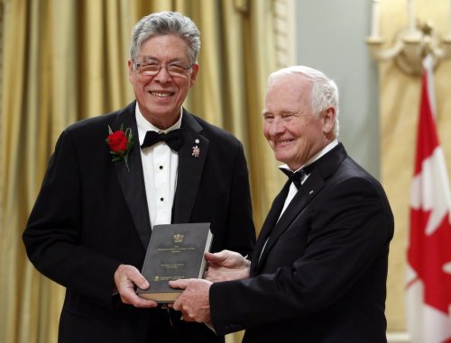 Thomas King is presented the Governor General's Literary Award for fiction by Governor General David Johnston during a ceremony at Rideau Hall in Ottawa, Wednesday, Nov. 26, 2014. THE CANADIAN PRESS/Patrick Doyle