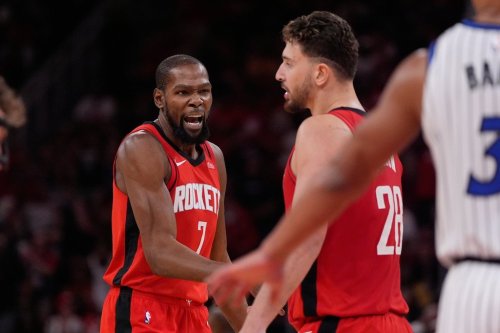 Houston Rockets forward Kevin Durant (7) celerbates with center Alperen Sengun (28) after a shot during overtime of an NBA basketball game against the Orlando Magic in Houston, Sunday, Nov. 16, 2025. (AP Photo/Ashley Landis)