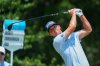 FILE - Max McGreevy hits off the 12th tee during the first round of the Charles Schwab Challenge golf tournament at Colonial Country Club in Fort Worth, Texas, May 22, 2025. (AP Photo/LM Otero, file)