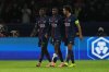 PSG's Nuno Mendes, from left, Ousmane Dembele and Marquinhos react during the Champions League opening phase soccer match between Paris Saint-Germain and Bayern Munich in Paris, France, Tuesday, Nov. 4, 2025. (AP Photo/Thibault Camus)