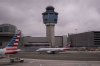 An American Eagle plane moves past the FAA Air Traffic Control tower at LaGuardia Airport (LGA) in the Queens borough of New York, Sunday, Nov. 9, 2025. (AP Photo/Adam Gray)