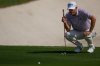 Nicolai Hojgaard of Denmark lines up a putt on the 5th green during the second round of World Tour Golf Championship at Jumeirah Golf Estates, in Dubai, United Arab Emirates, Friday, Nov. 14, 2025. (AP Photo/Altaf Qadri)