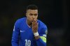 France's Kylian Mbappe celebrates the opening goal during a World Cup 2026 group D qualifying soccer match between France and Ukraine in Paris, Thursday, Nov. 13, 2025. (AP Photo/Christophe Ena)