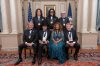 The 2025 Kennedy Center Honorees, front row from left, Sylvester Stallone, George Strait, Gloria Gaynor and Michael Crawford; back row from left, members of the rock band KISS, Paul Stanley, Gene Simmons and Peter Criss, pose for a group photo at the 48th Kennedy Center Honors Medallion Reception, hosted at the U.S. Department of State, Saturday, Dec. 6, 2025 in Washington. (AP Photo/Kevin Wolf)
