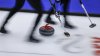 A curling stone slides down the ice sheet at the Scotties Tournament of Hearts in Calgary on Feb. 21, 2024. THE CANADIAN PRESS/Jeff McIntosh