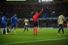 Referee Slavko Vincic shows a red card to Barcelona's Ronald Araujo during the Champions League opening phase soccer match between Chelsea and Barcelona in London, Tuesday, Nov. 25, 2025. (AP Photo/Kin Cheung)
