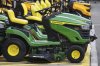 John Deere lawn tractors sit on display outside a Home Depot in Robinson Township, Pa., Friday, April 11, 2025. A video claiming the farm equipment giant was moving its factories from Canada to the United States misled some social media users this week. John Deere hasn't had a manufacturing facility in Canada since 2009. THE CANADIAN PRESS/AP-Gene J. Puskar
