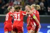 Bayern's Glodis Viggosdottir, right, celebrates after scoring her side's third goal during the women's Champions League opening phase soccer match between FC Bayern Munich and Arsenal FC in Munich, Germany, Wednesday, Nov. 12, 2025. (AP Photo/Matthias Schrader)