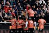 FILE - Lorient's players celebrates during the French League One soccer match between FC Lorient and Paris Saint-Germain at the Moustoir stadium in Lorient, western France, Sunday, Nov. 6, 2022. (AP Photo/Jeremias Gonzalez, File)