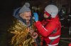 A paramedic gives first aid to a resident who was injured in a Russian airstrike in Kharkiv, Ukraine, late Sunday, Nov. 23, 2025. (AP Photo/Andrii Marienko)
