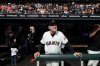 FILE - San Francisco Giants manager Bruce Bochy stands in the dugout before a baseball game between the Giants and the Los Angeles Dodgers in San Francisco, Sept. 29, 2019. (AP Photo/Jeff Chiu, File)